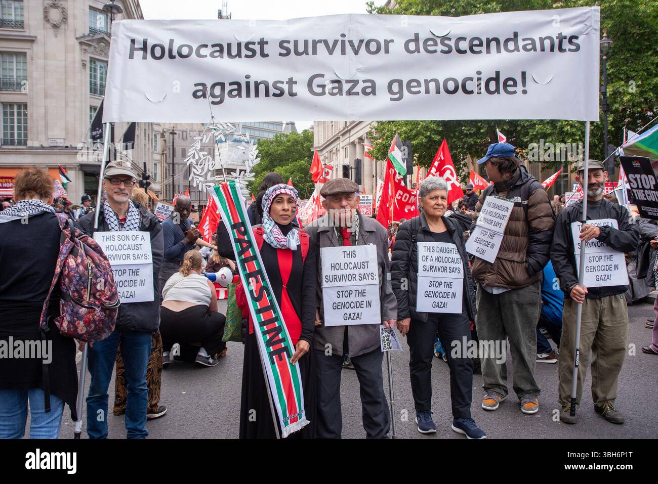 London, UK. 07th June, 2025. The Holocaust survivor, Stephen Kapos (centre) poses for a photo with a pro-Palestine activist during the Welfare Not Warfare' demonstration. Union members and activists gathered near the BBC Broadcasting House in London and marched to the Downing Street to oppose the government benefit cuts and put people before profit. (Photo by Krisztian Elek/SOPA Images/Sipa USA) Credit: Sipa USA/Alamy Live News Stock Photo