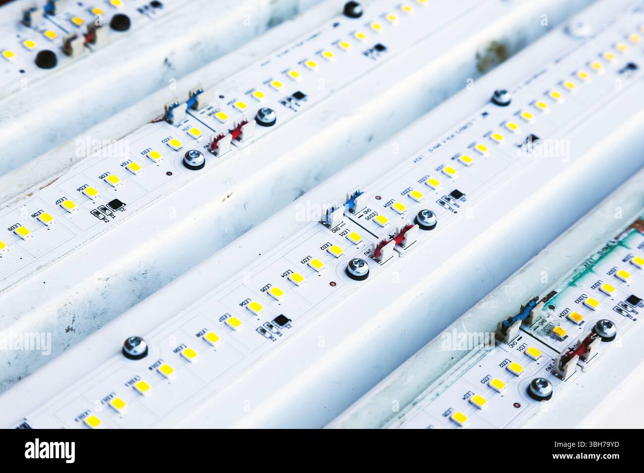 Long LED lamps stacked in a row Stock Photo - Alamy