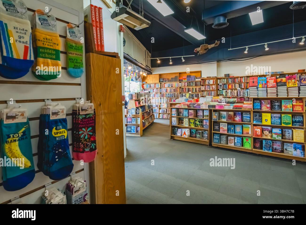 Washington D.C., USA, - May 23, 2025 - An inviting interior of Kramers books showing shelves of books under bright lighting Stock Photo