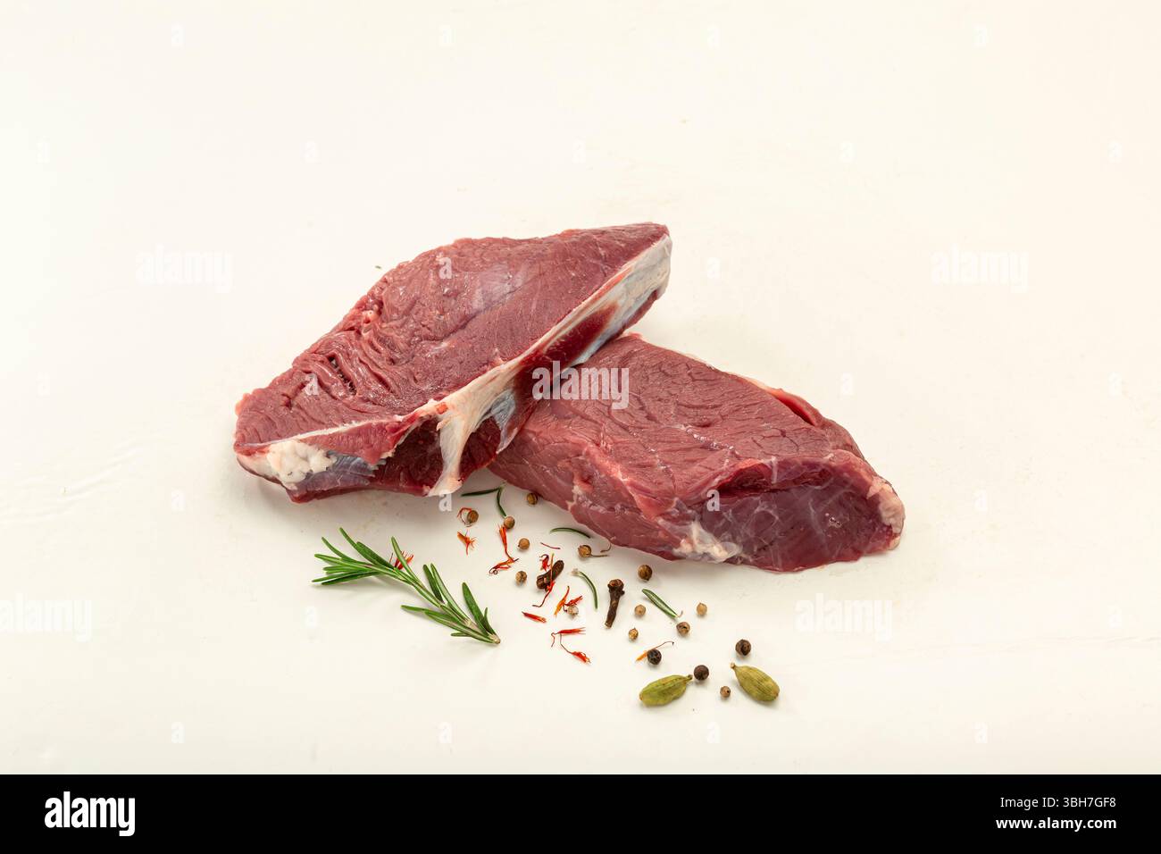 Raw veal pieces isolated on white background. Stock Photo
