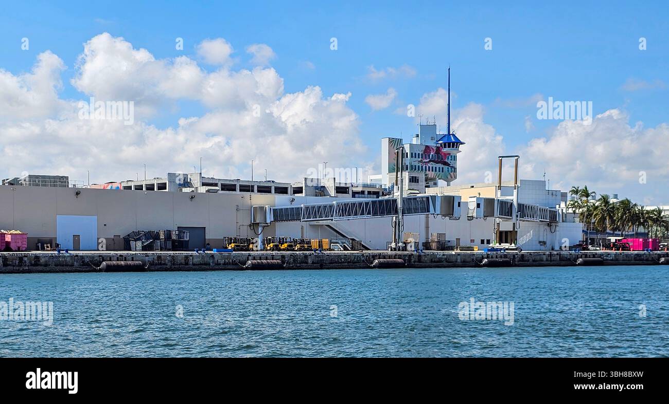 Port Everglades Pier 26 and Harbormaster Tower. One of the cruise ship piers with the administration tower in the background. - Smartphone Captured Stock Image