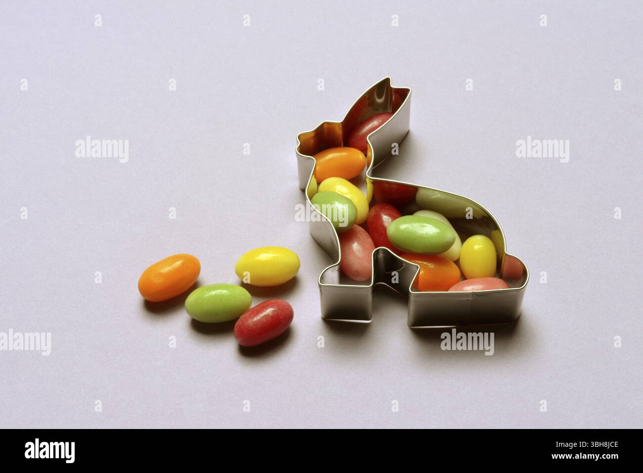 Bunny baking tin and sugar Easter eggs, cookie cutter Stock Photo