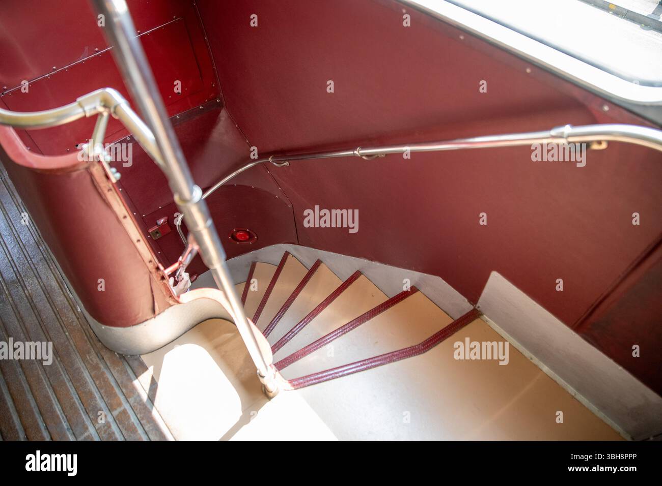 the-stairwell-of-a-restored-classic-london-bus-volunteers-operating