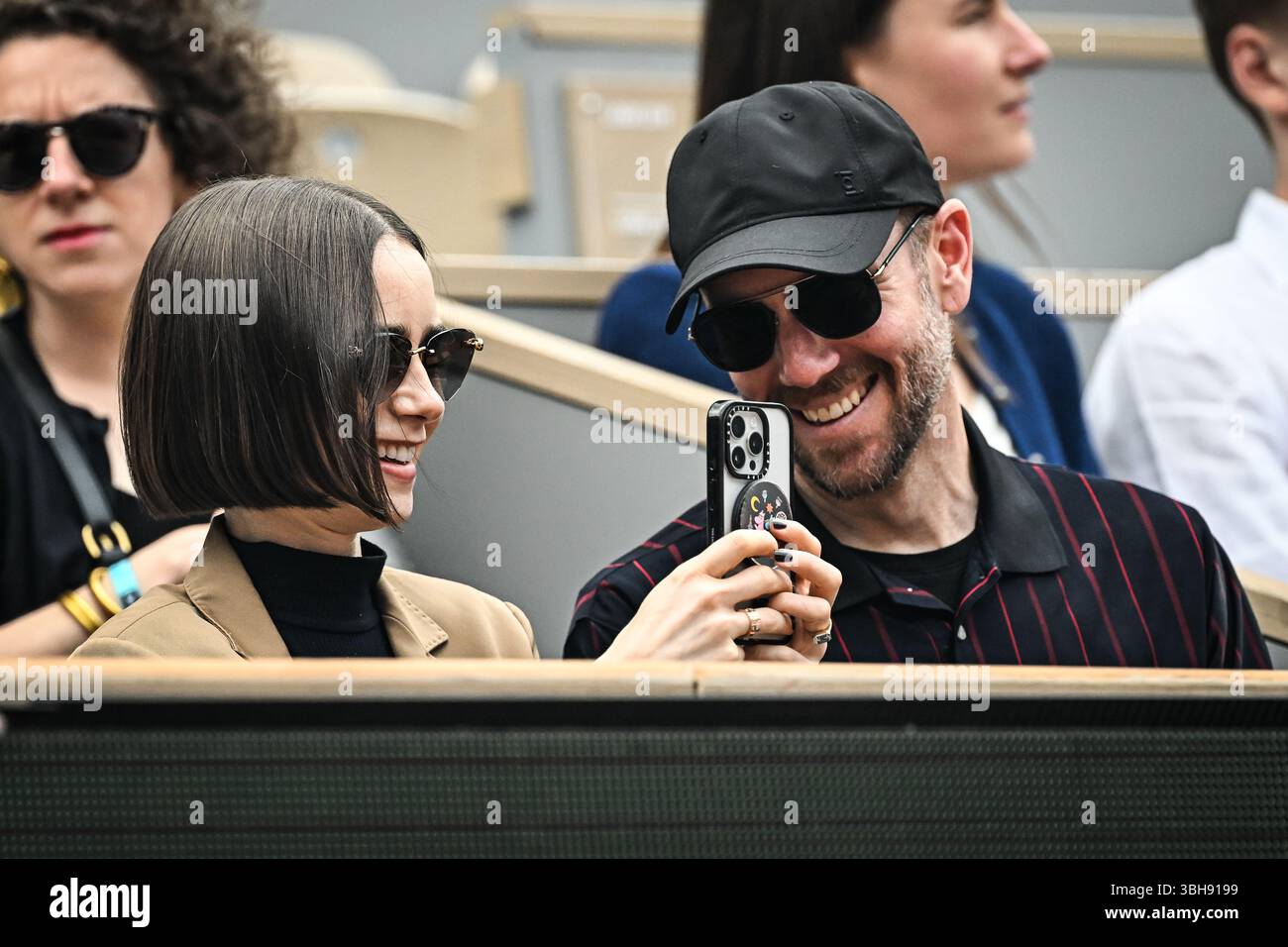 Lily COLLINS her husband Charlie MCDOWELL during the fifteenth day of ...
