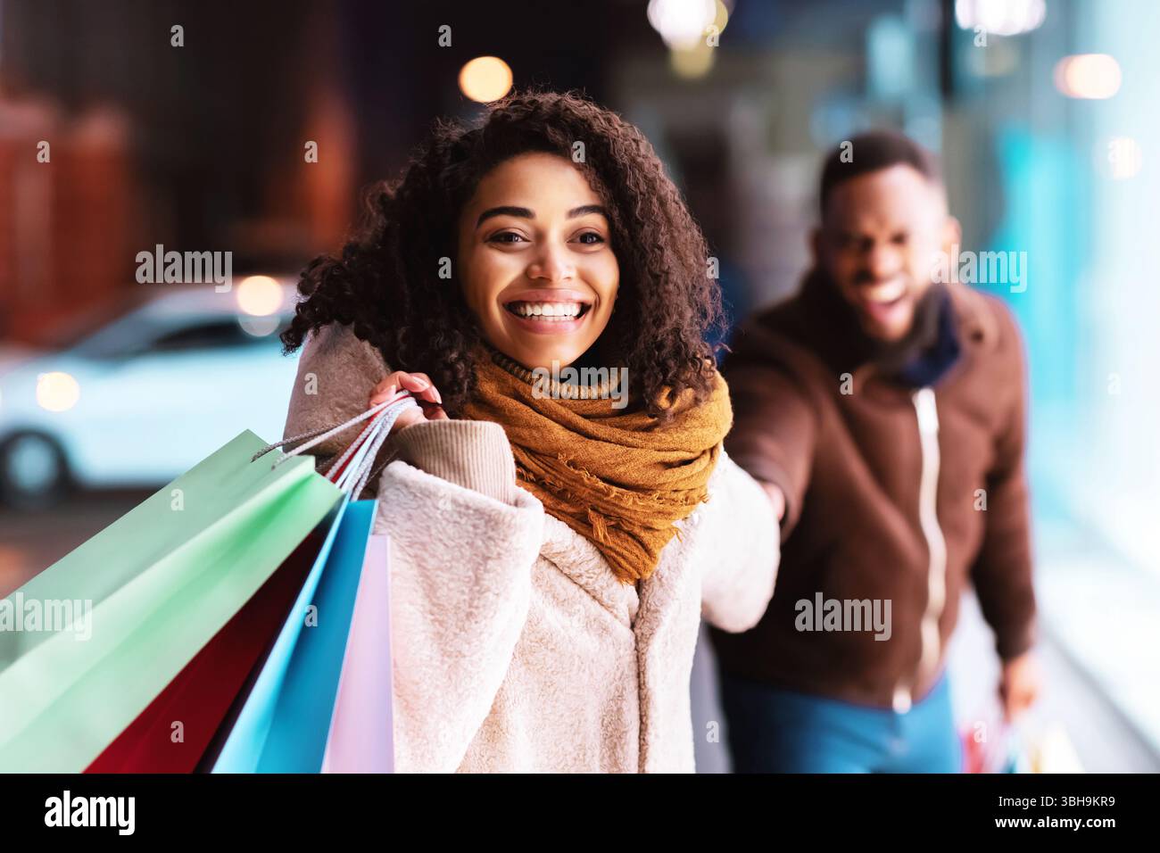 Excited black woman boyfriend hi-res stock photography and images - Alamy