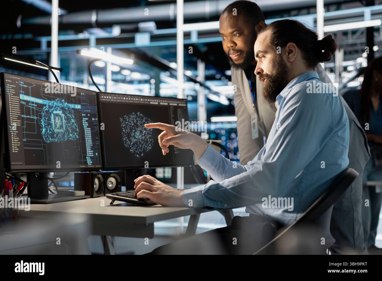 Team of technicians using PC in data center, integrating AI driven automation tools, doing maintenance. Server farm coworkers using artificial intelligence machine learning models Stock Photo