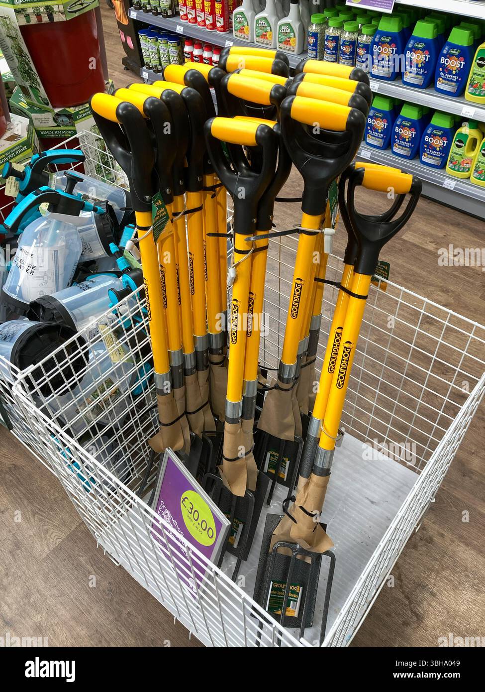 Garden Spades and Garden Forks for sale at the Garden Centre - Smartphone Captured Stock Image