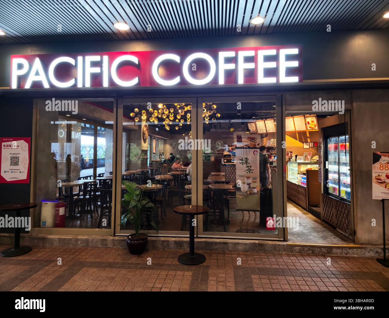 Pacific Coffee at the 1st floor walking level at the Great Eagle Centre in Wanchai, Hong Kong. - Smartphone Captured Stock Image