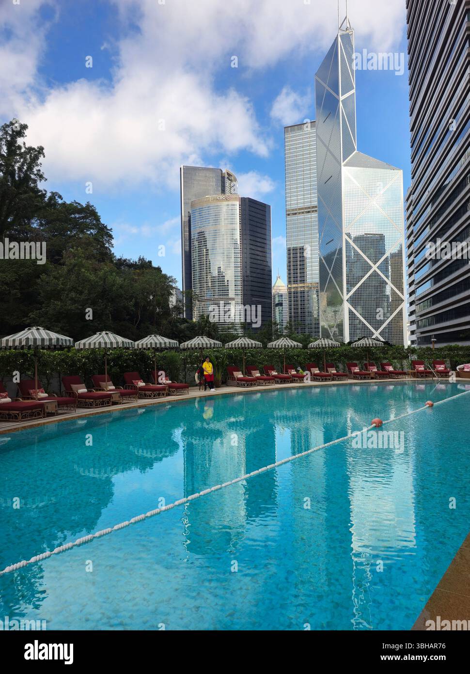 The Bank of China tower viewed from the swimming pool of the Shangri-La hotel in Hong Kong. - Smartphone Captured Stock Image