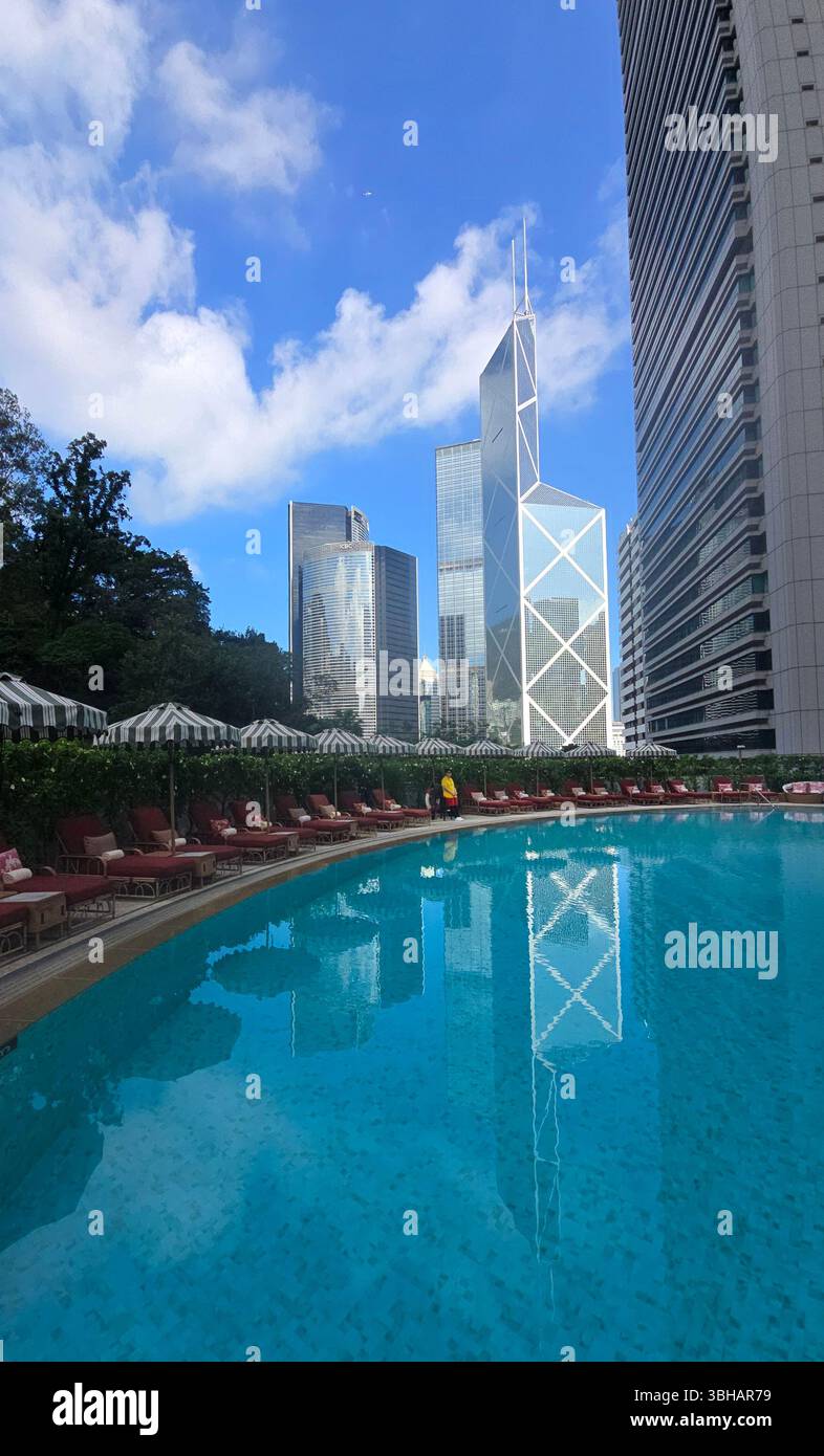 The Bank of China tower viewed from the swimming pool of the Shangri-La hotel in Hong Kong. - Smartphone Captured Stock Image