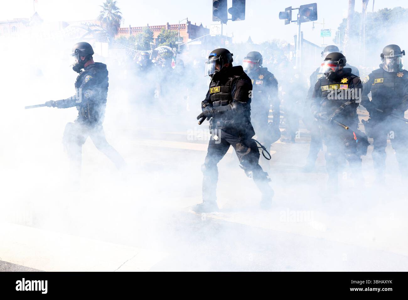 Los Angeles, Ca, USA. 8th June, 2025. CHP officers in a cloud of smoke ...
