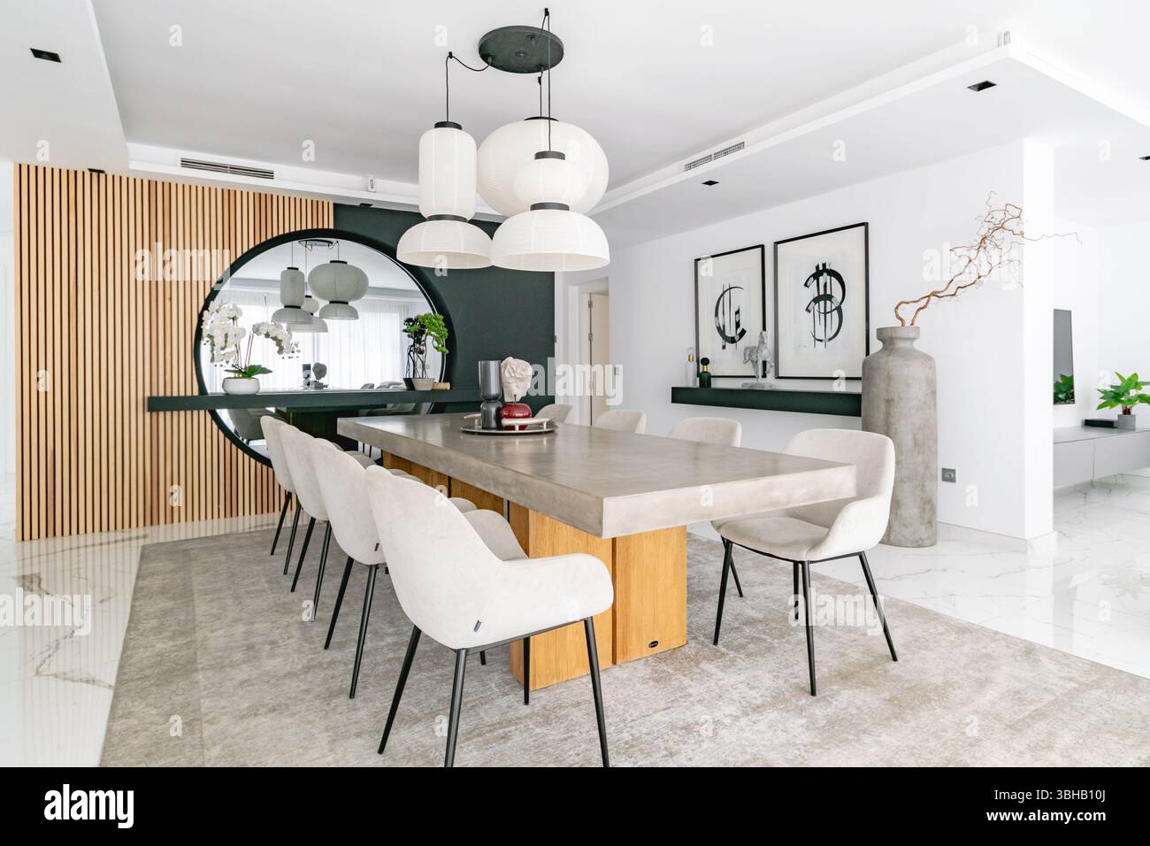 a large marble dining table and chairs in luxurious mediterranean ...