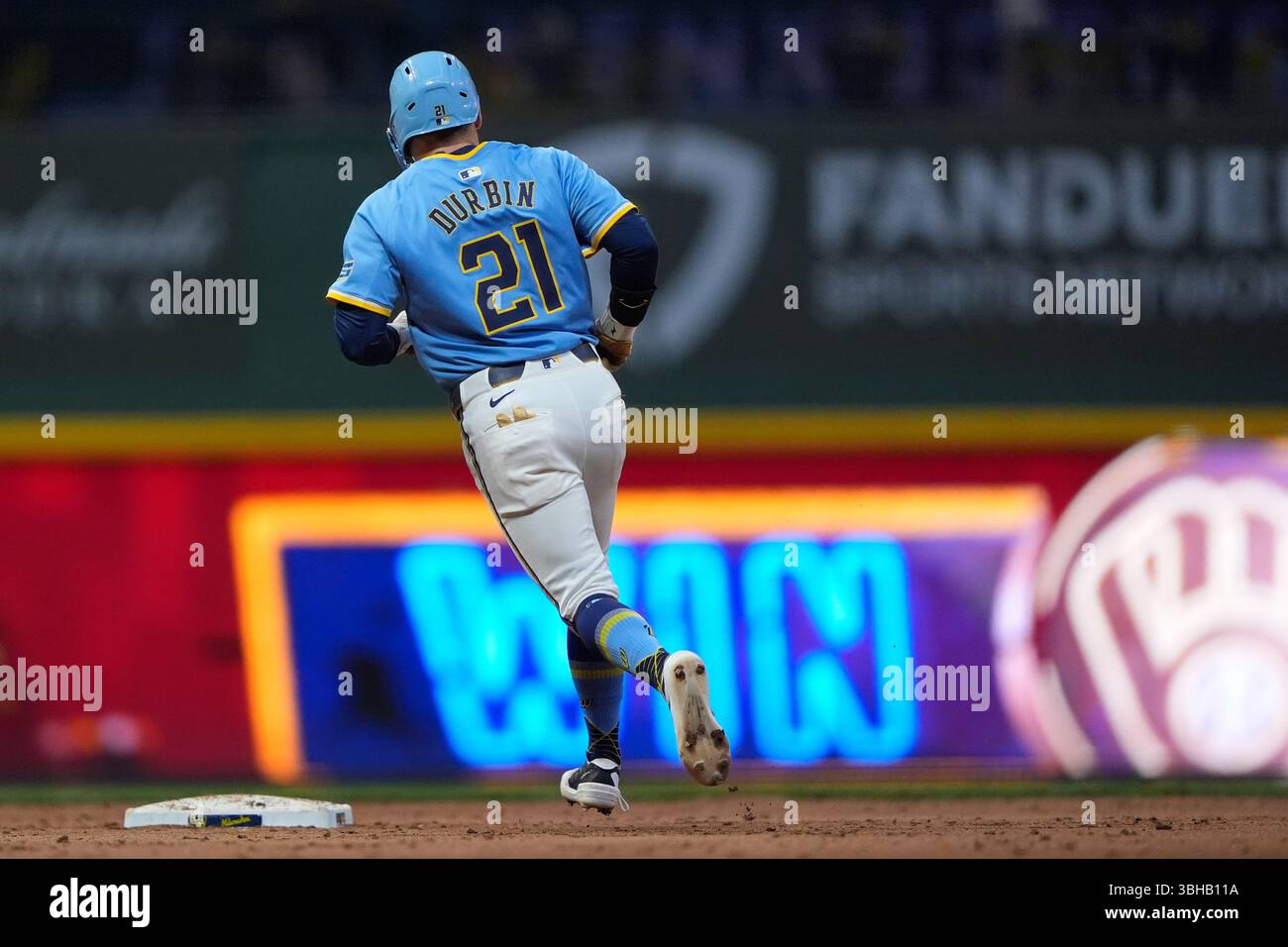 Caleb Rounds Milwaukee Brewers' Caleb Durbin rounds the bases after hitting a walk ...