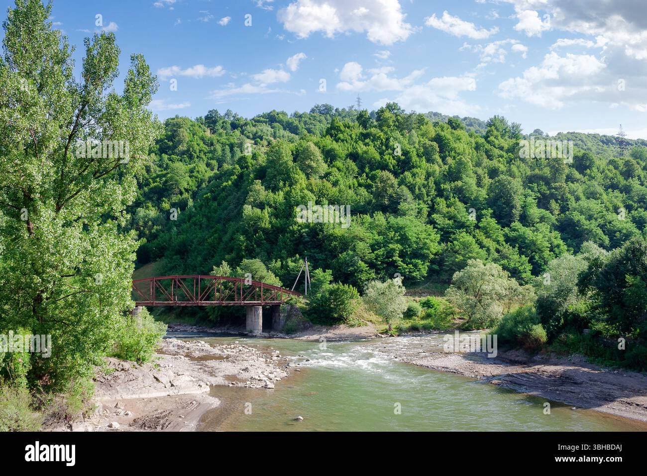 tisza river near rakhiv town. carpathian mountain landscape in summer. place where two stream join Stock Photo
