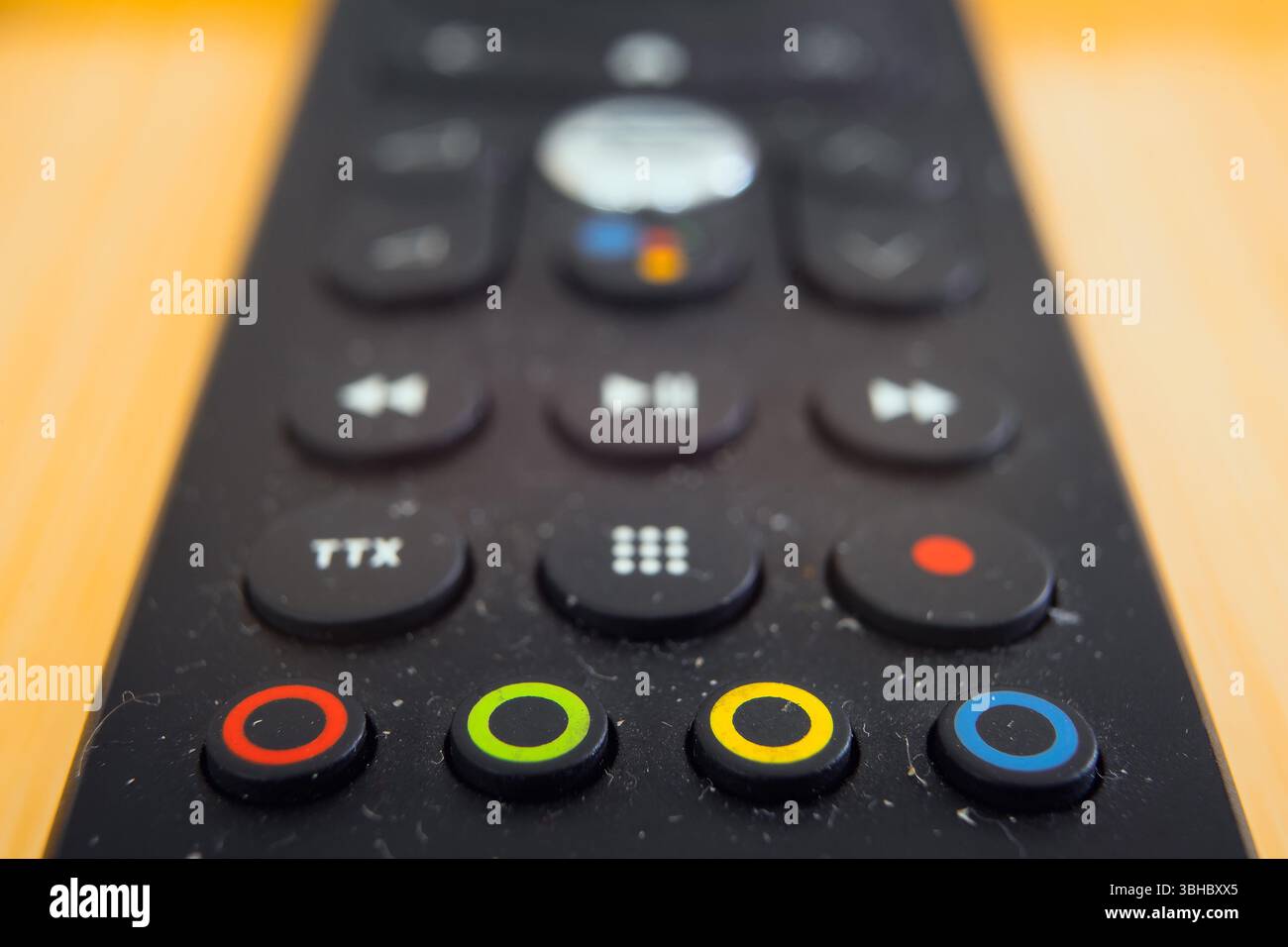 Universal remote control for TVs, macro composition of programming buttons. Stock Photo