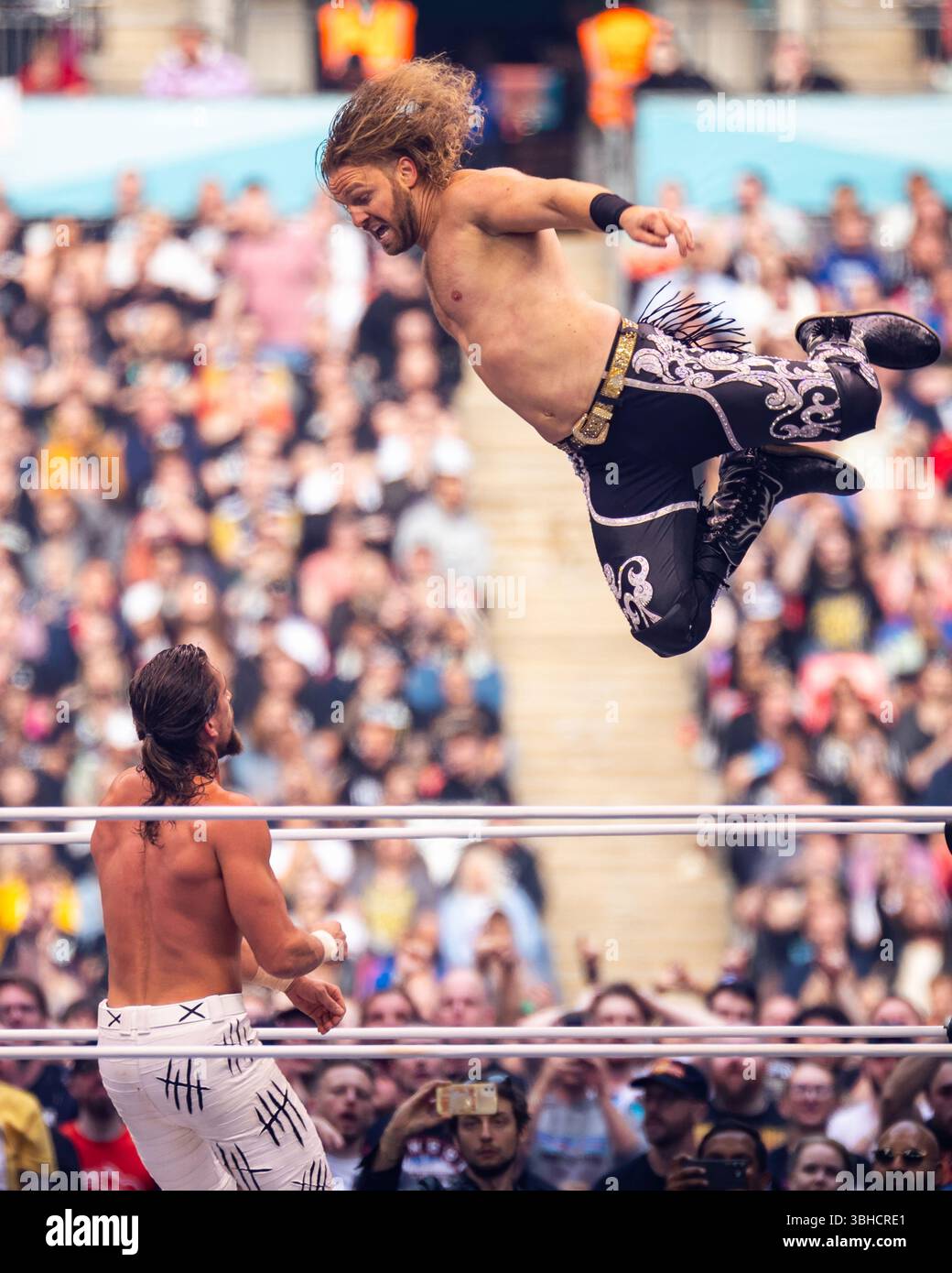 Hangman Page diving off the top rope at All Elite Wrestling: All In 2023, at Wembley Stadium, London Stock Photo