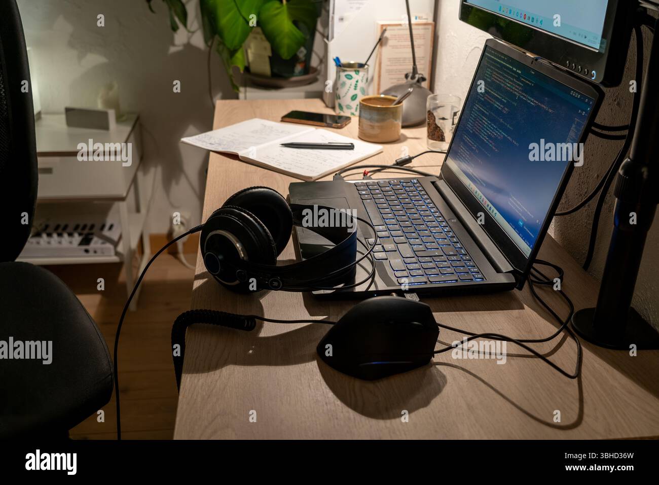 Home office desk at night. High quality photo Stock Photo