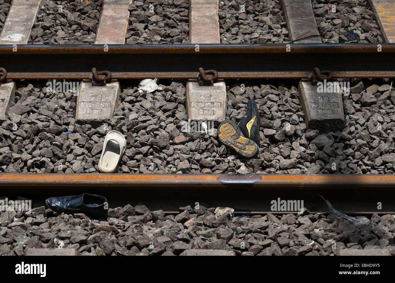 THANE, INDIA JUNE 9 Footwear of victims seen on the railway track at(01)