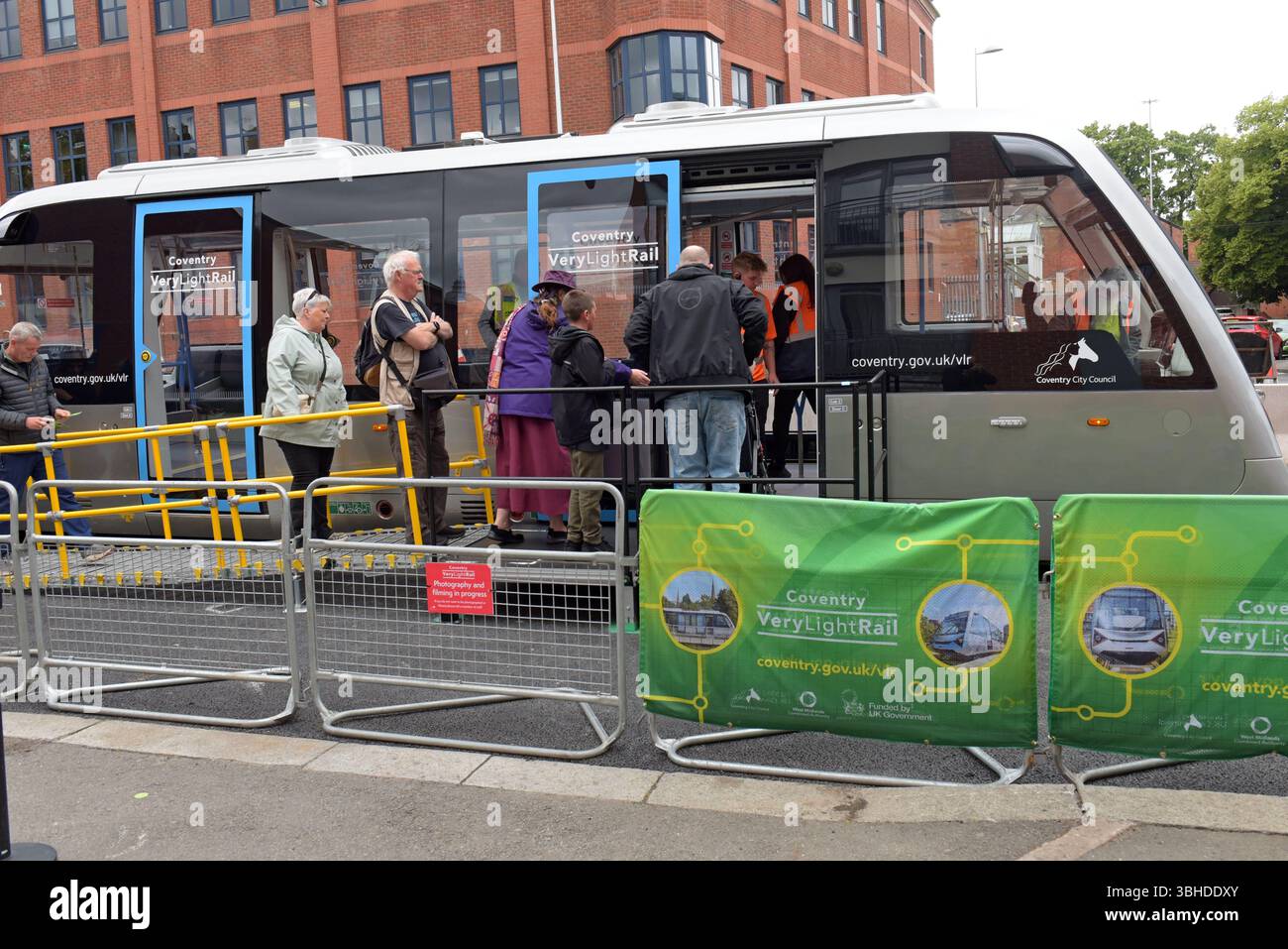 passengers getting on the Coventry VLR Very Light Rail test track, the pioneering new tram system in Coventry, 8th June 2025 Stock Photo