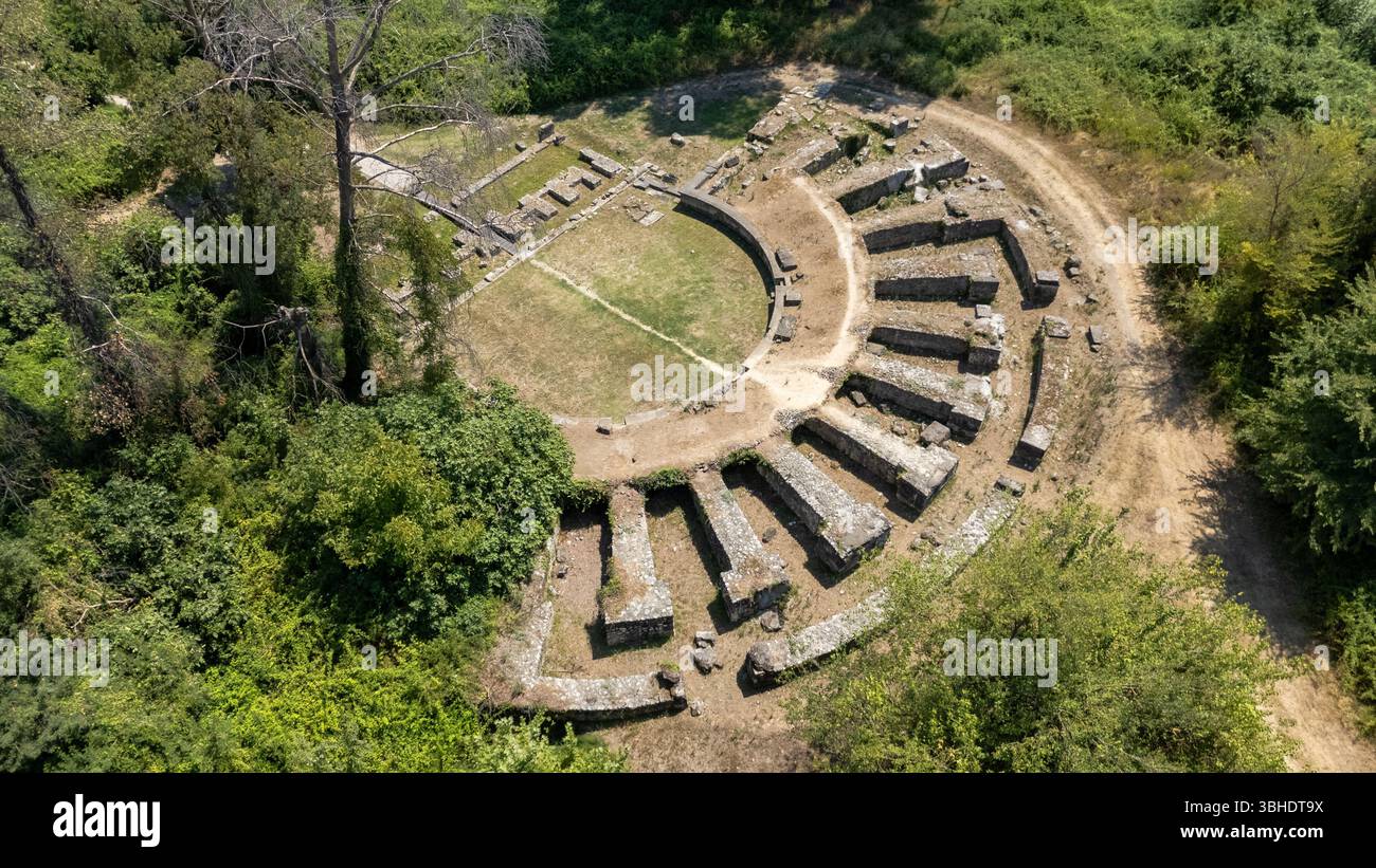 Aerial view of an ancient Roman amphitheater of Dion, Greece surrounded ...