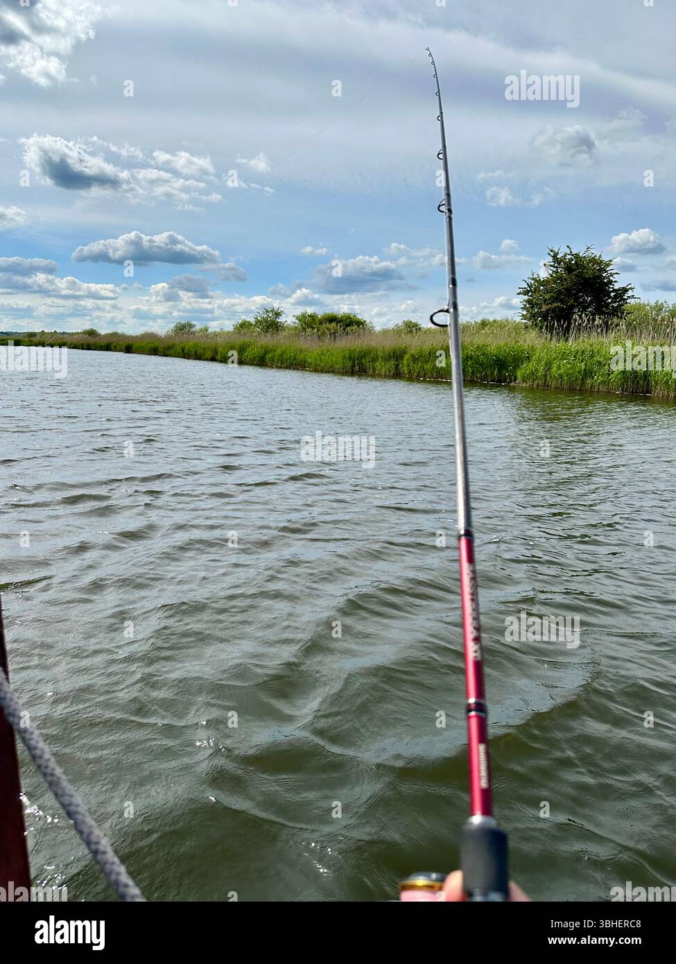 Fishing in the river Peene, Mecklenburg-Vorpommern, Germany - Smartphone Captured Stock Image