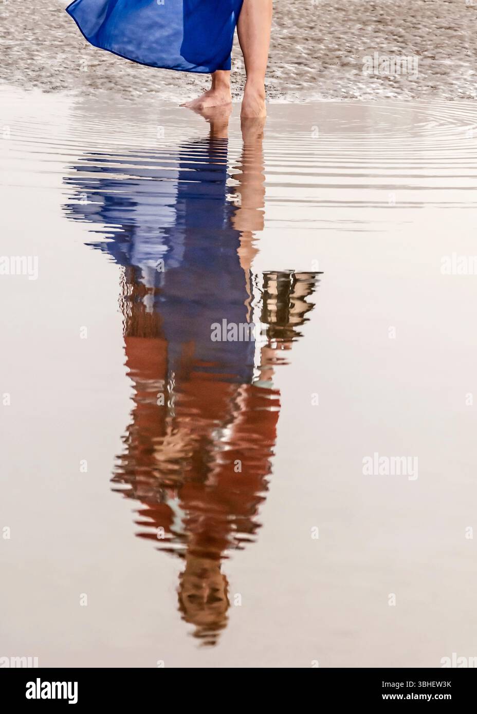Woman in dress wading in water hi-res stock photography and images - Alamy