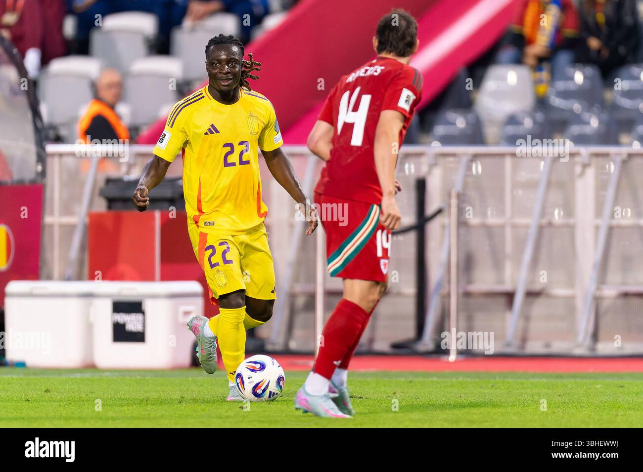 BRUSSELS, BELGIUM - JUNE 9: Jeremy Doku of Belgium battles for the ball with Connor Roberts of Wales during the FIFA 2026 World Cup Qualifier match between Belgium and Wales at King Baudouin Stadium on June 9, 2025 in Brussels, Belgium. (Photo by Joris Verwijst/Orange Pictures) Credit: Orange Pics BV/Alamy Live News Stock Photo