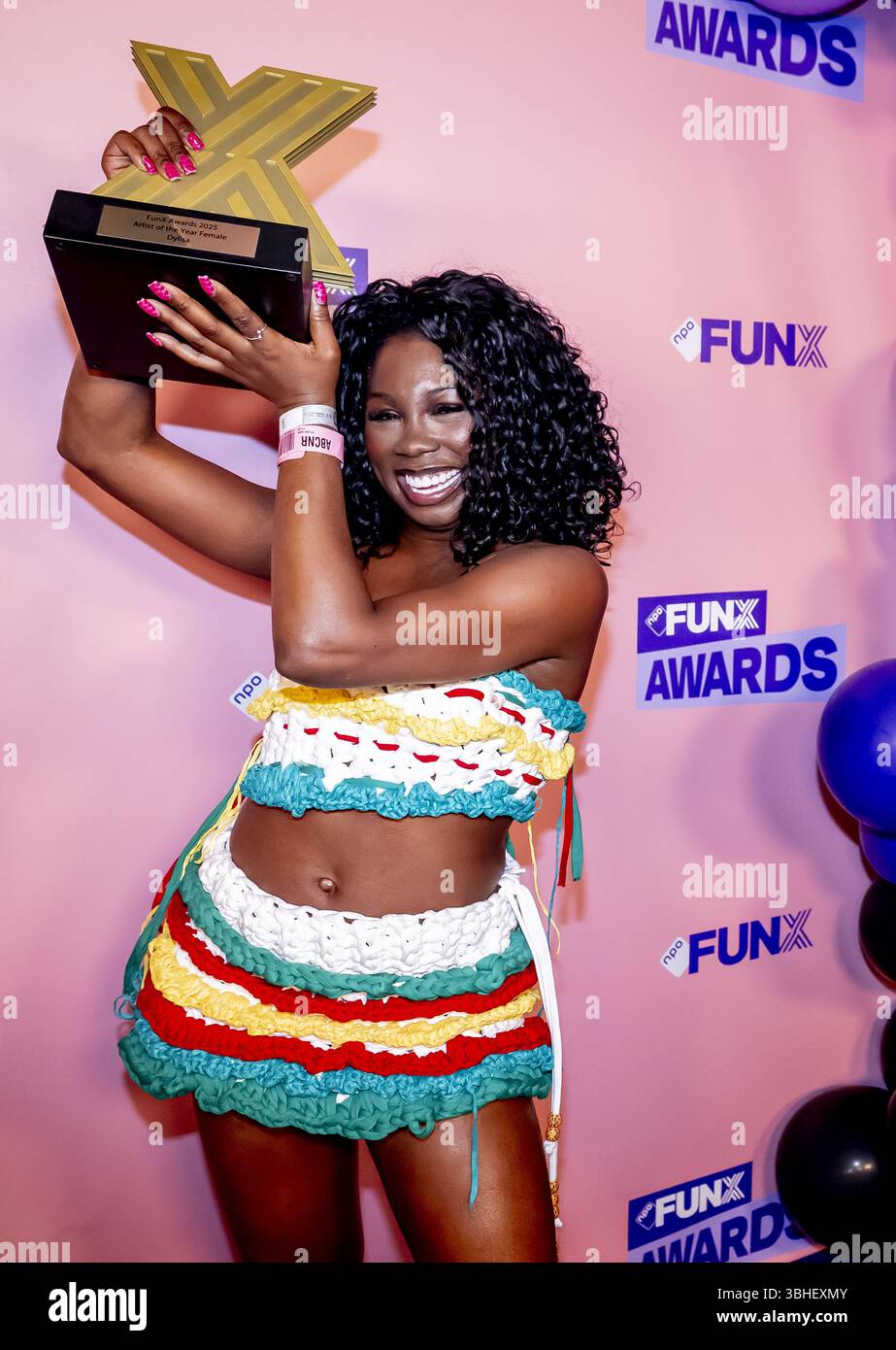 AMSTERDAM DYLISA Shows Off The Prize Won On The Purple Carpet After amsterdam-dylisa-shows-off-the-prize-won-on-the-purple-carpet-after