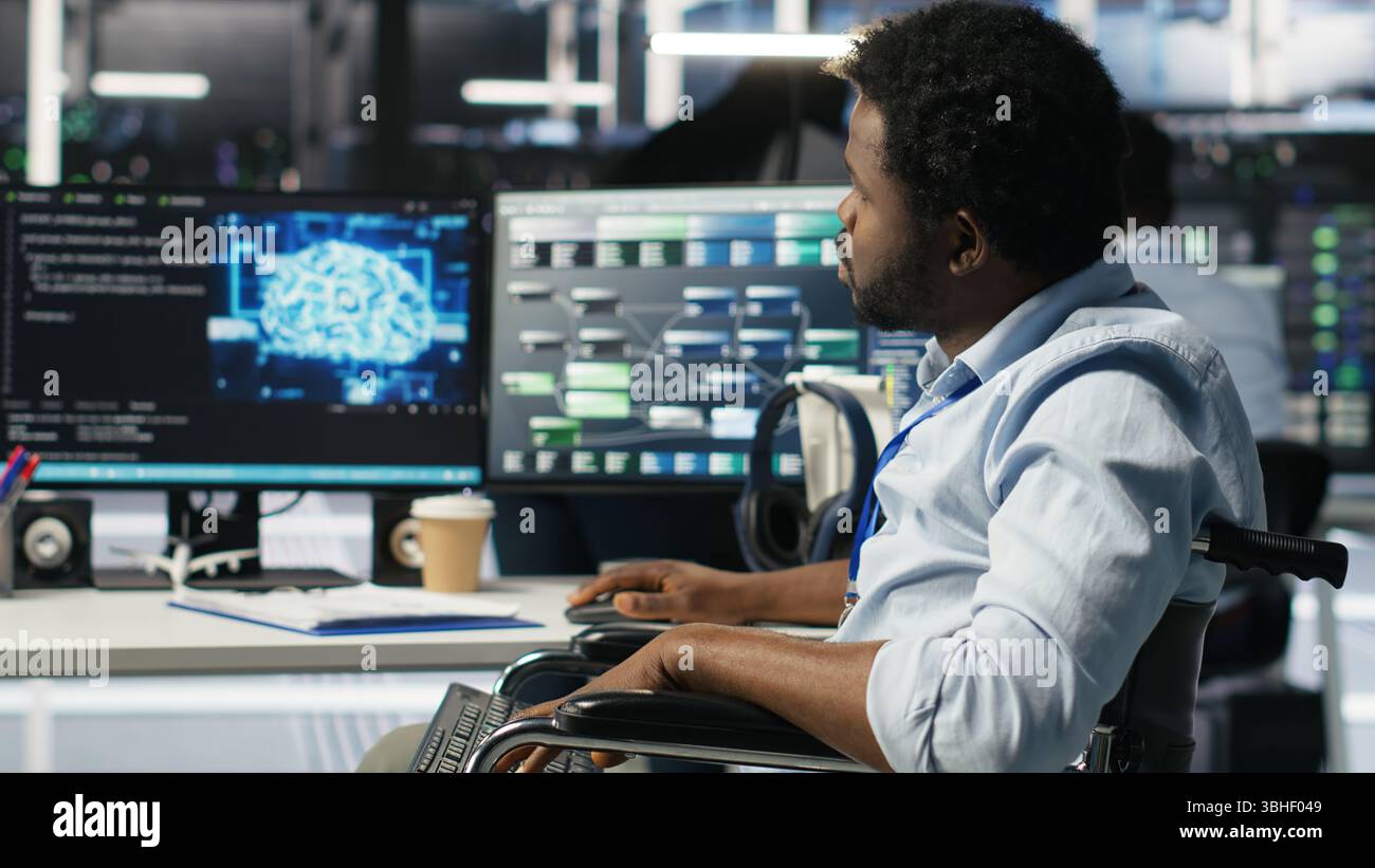 Engineer using wheelchair in data center using AI node tree software to ...