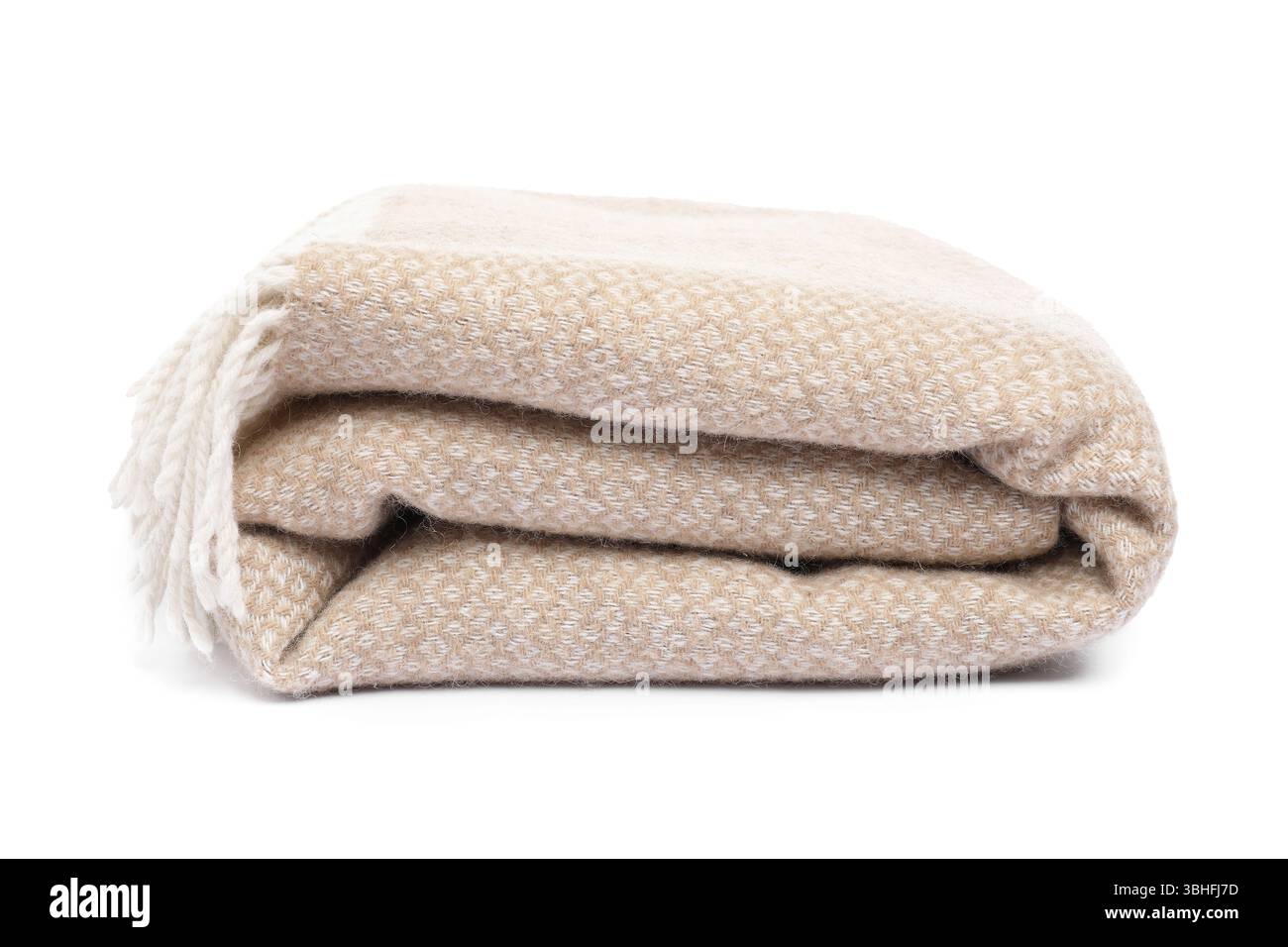 Folded beige woolen blanket isolated on white Stock Photo