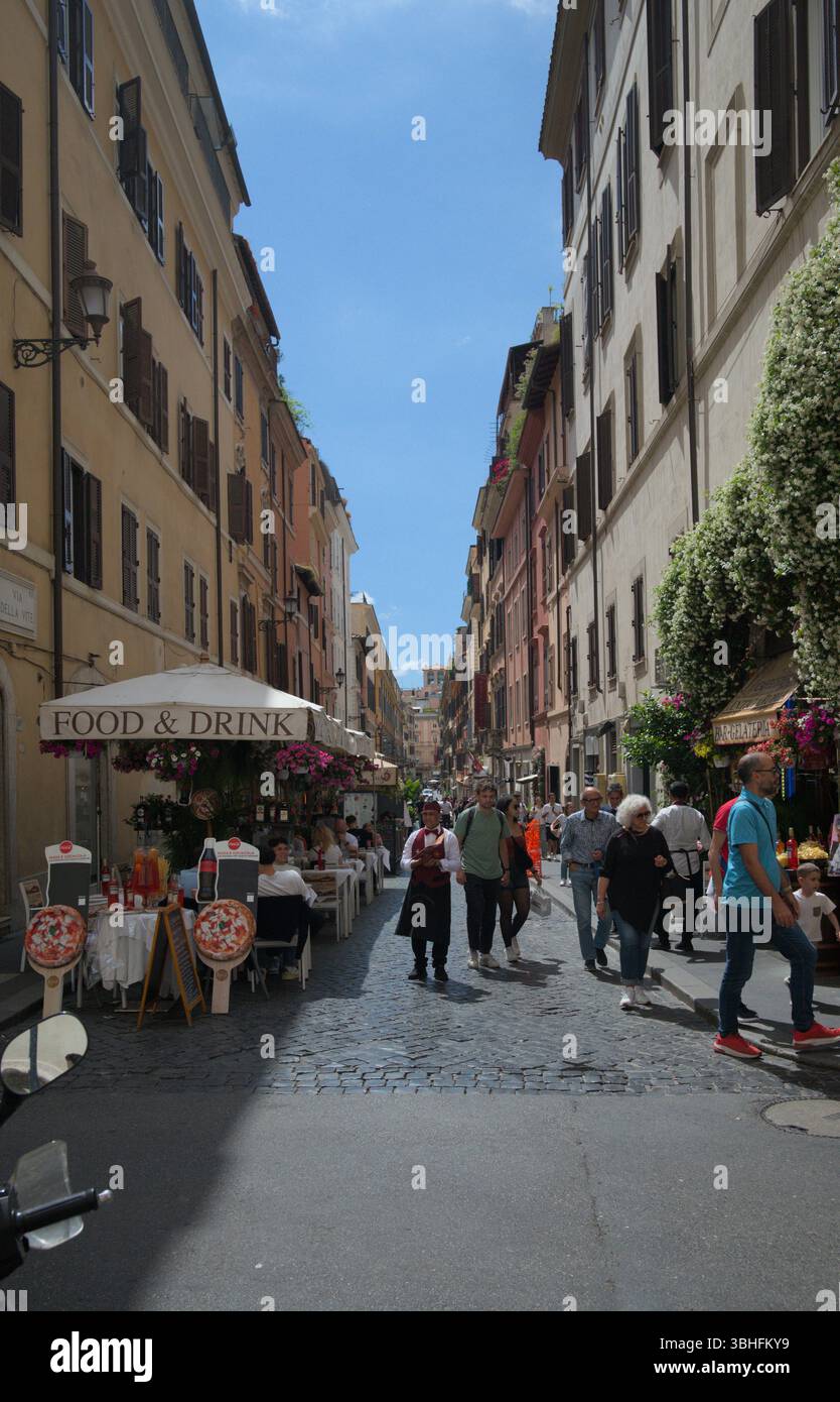 Cobblestone Walk Rome Narrow street in rome pedestrians hi-res stock photography and images ...