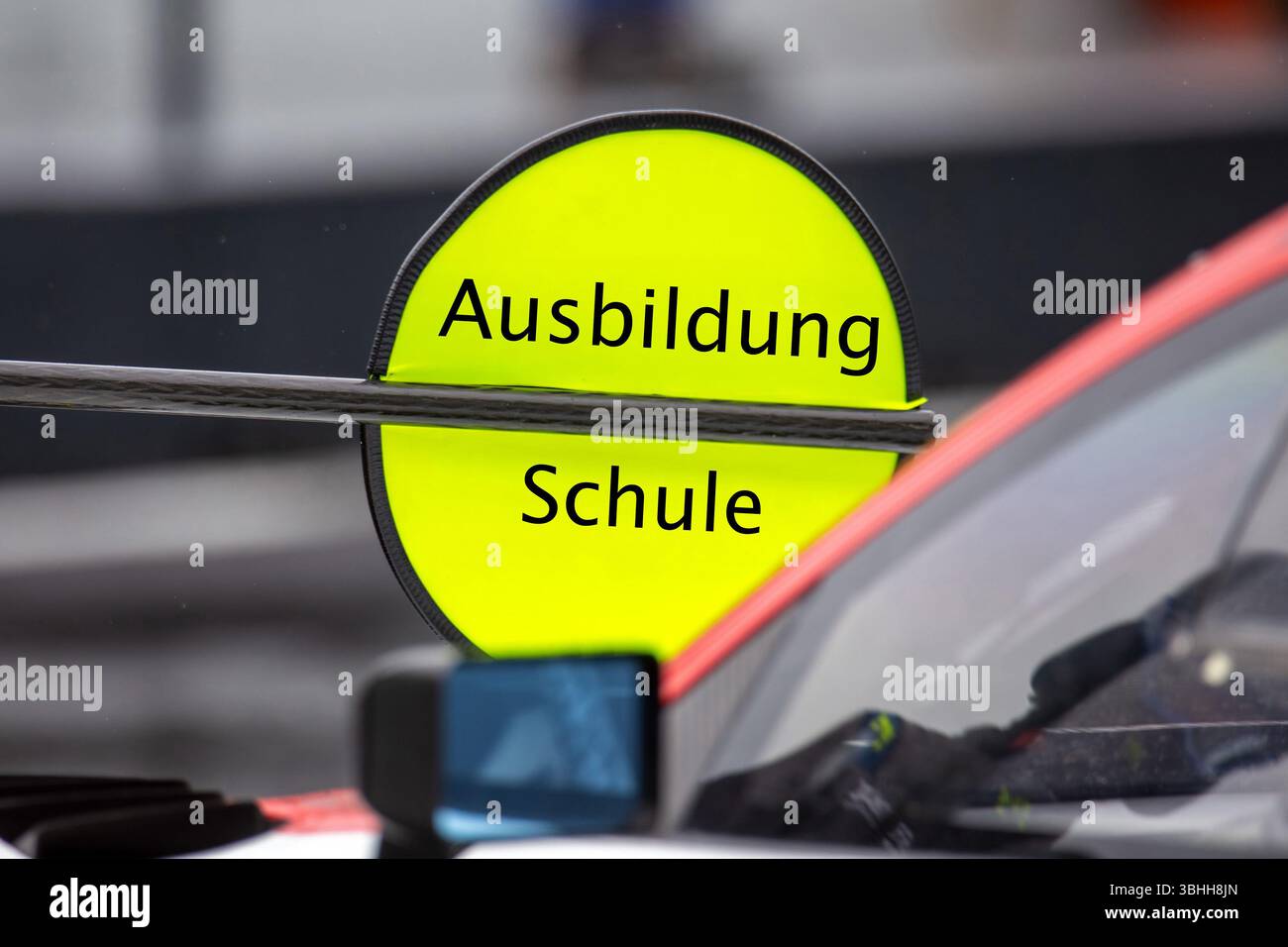 (Photomontage) Training Symbol image: Lollipop in motorsport with modified text Ausbildung / Schule Stock Photo