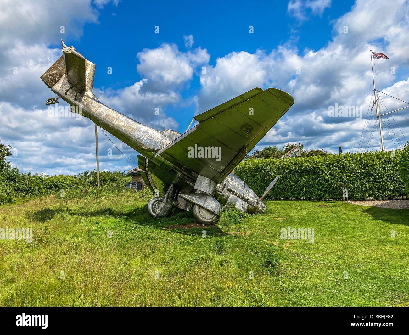 Down to Earth, a stainless steel sculpture of a Downed Junkers JU 87 B Stuka, by HEX . F.R.B.S. at the Battle of Britain Memorial,  Capel-le-Ferne, - Smartphone Captured Stock Image