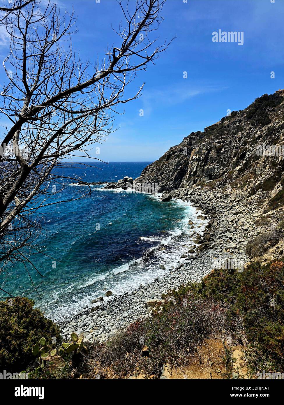 Majestic cliffside view overlooking a calm sea - nature's raw and powerful beauty. - Smartphone Captured Stock Image