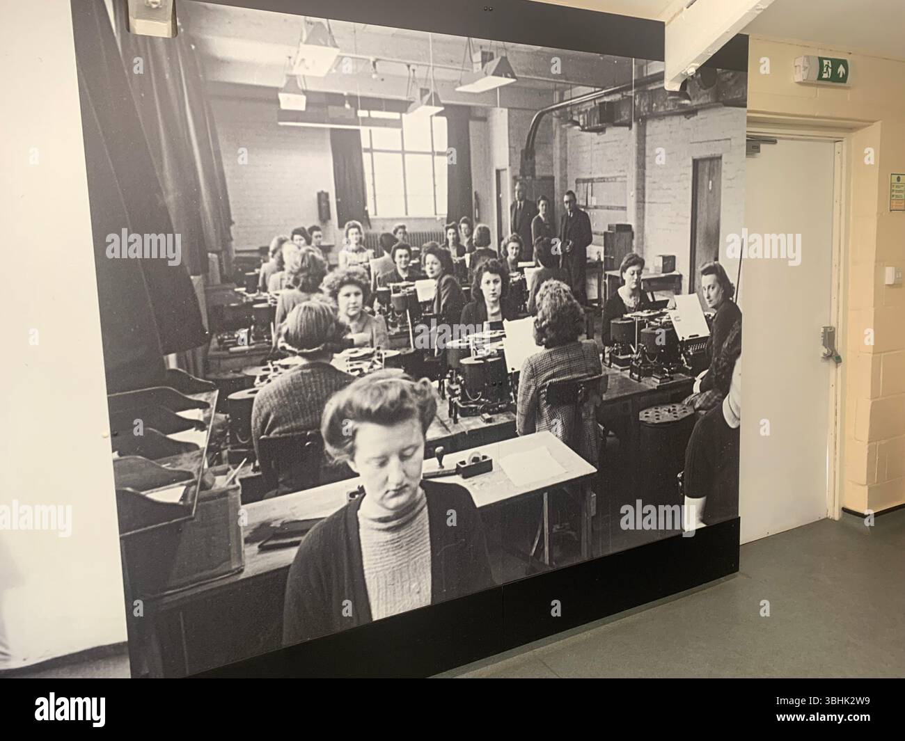 girls girl bomb Bletchley Park British war wartime typists work working inside imitation game computer place military soldiers desk Wrens  navy Uk - Smartphone Captured Stock Image