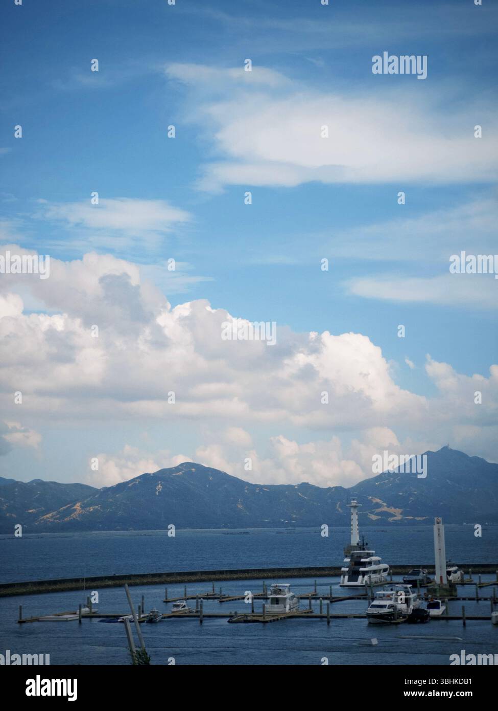 Marina with Yachts, Lighthouse, Mountain Coastline,Shenzhen,Guangdong,China - Smartphone Captured Stock Image