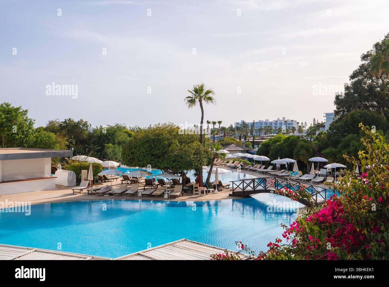 Luxurious Resort in Cyprus with Pool, Sun Loungers, and Greenery Stock ...