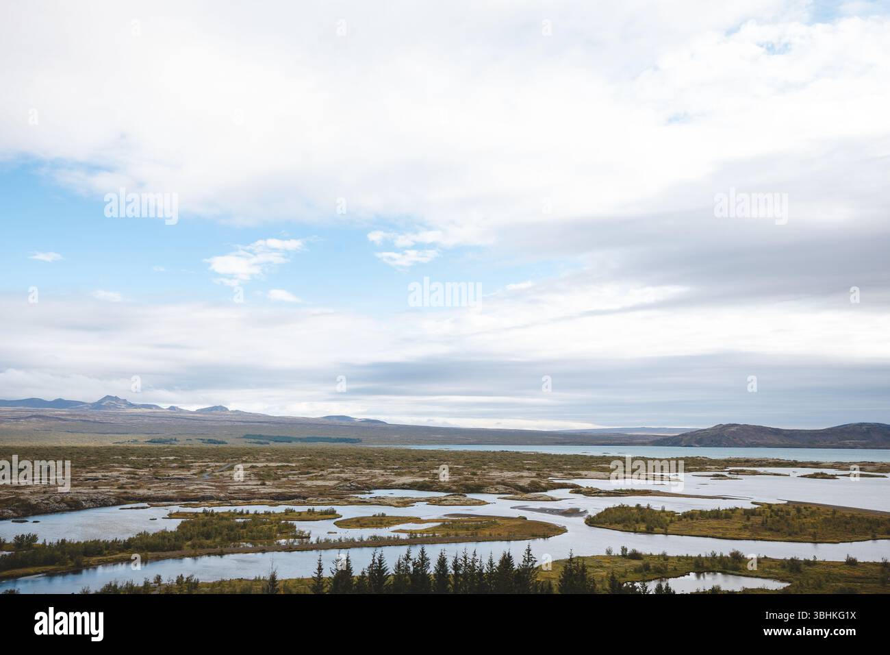 Aerial view over the winding rivers and wetlands of Thingvellir ...