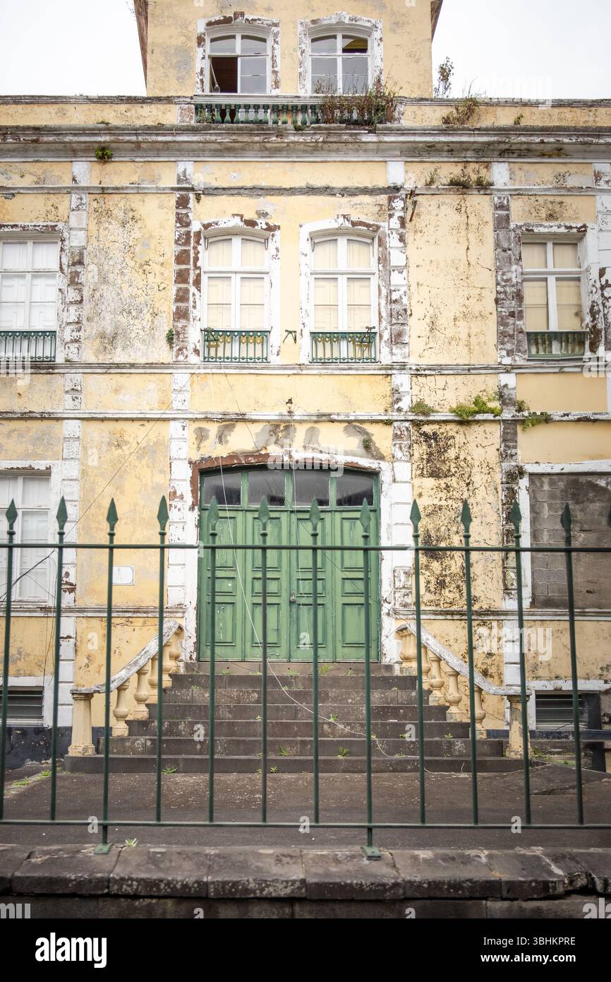 Gated Green Double Door of Abandoned European Schoolhouse – Rustic ...
