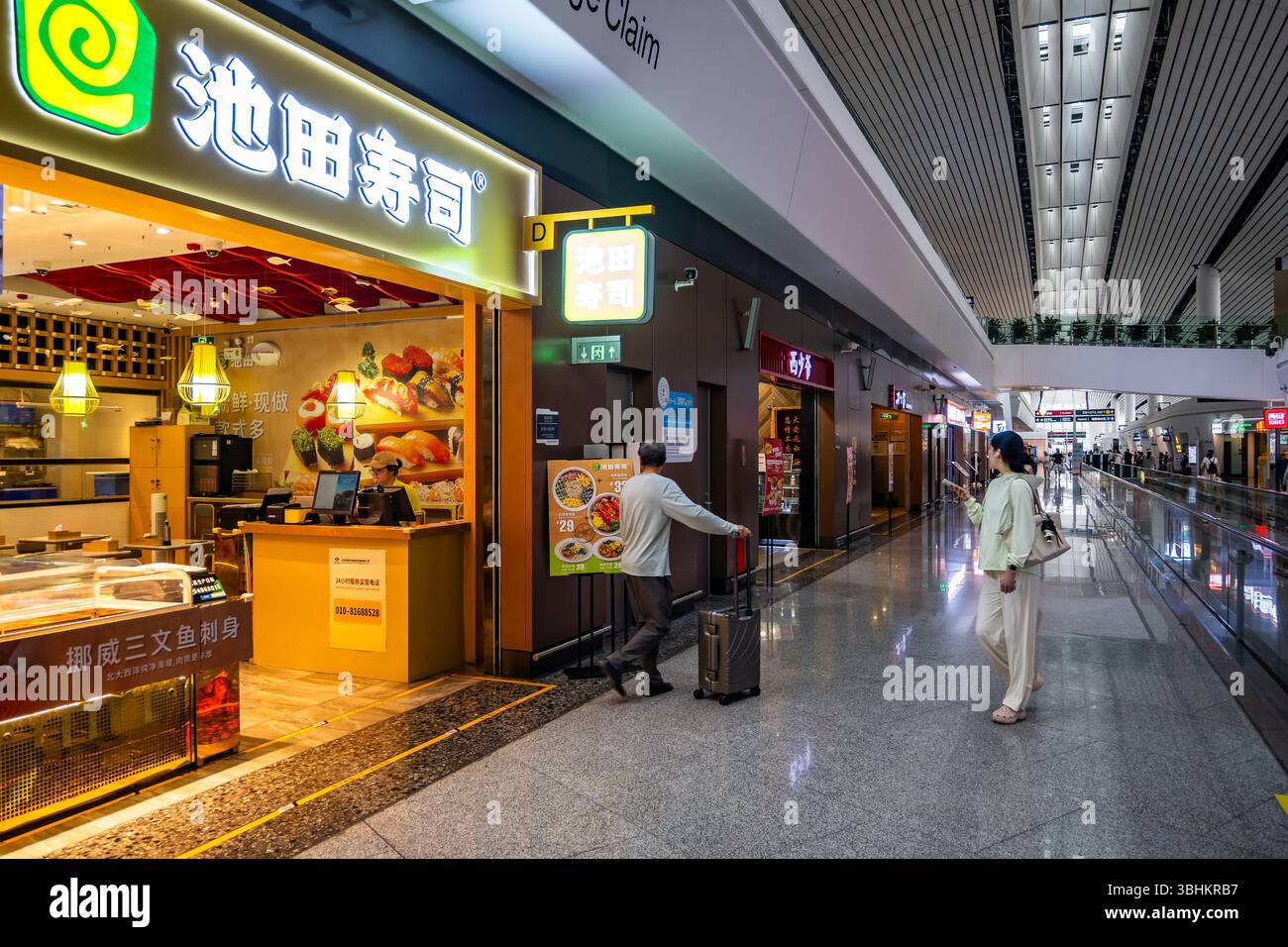 Varieties of restaurants inside the terminal of Beijing Daxing International Airport. Beijing, China. Stock Photo