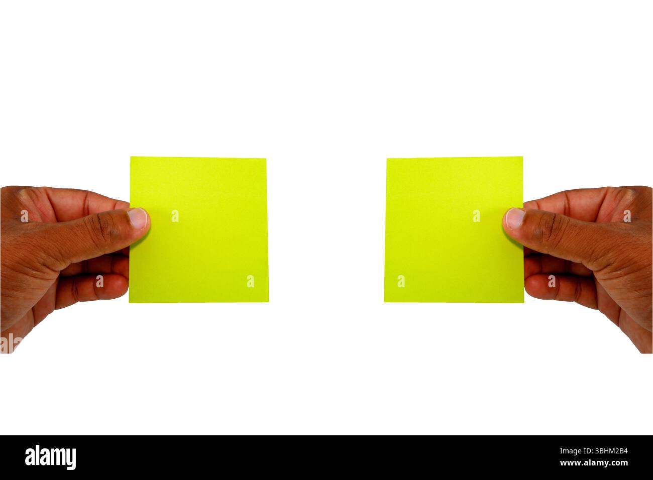 yellow card showing by two hands, sticky notes holding by hands with ...