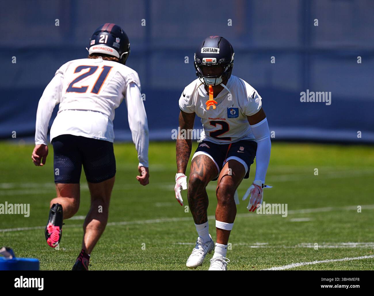 Denver Broncos cornerbacks Riley Moss, left, and Pat Surtain II take ...