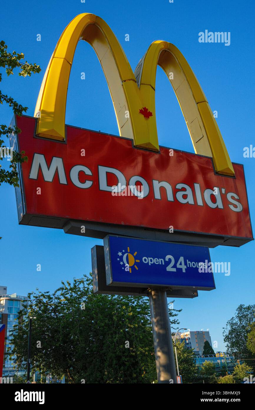 The McDonald's golden arches on Main Street in Vancouver, BC. It will soon be demolished & rebuilt with new condos on top after 50 plus years here. Stock Photo