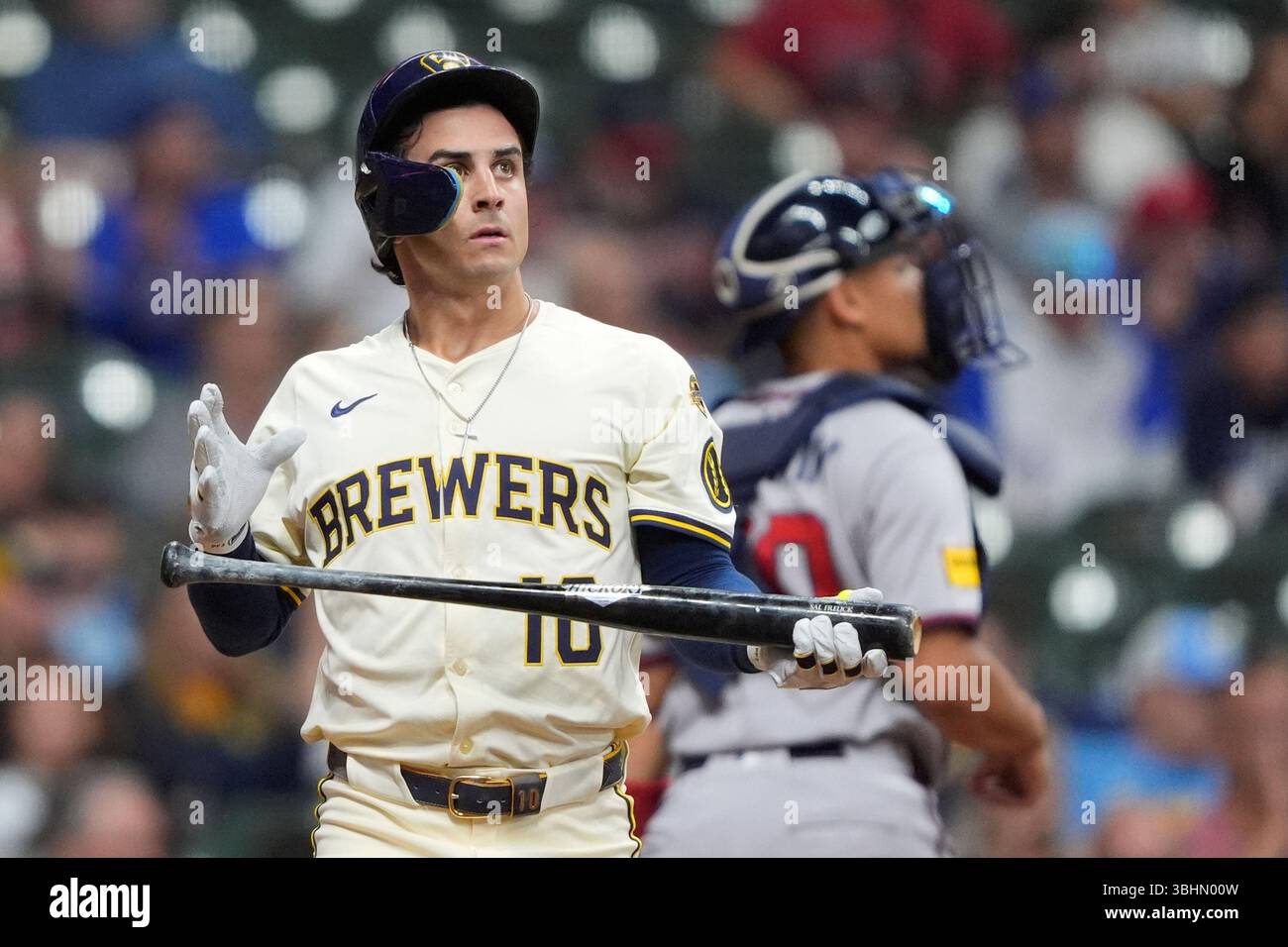 Milwaukee Brewers' Sal Frelick reacts after striking out during a