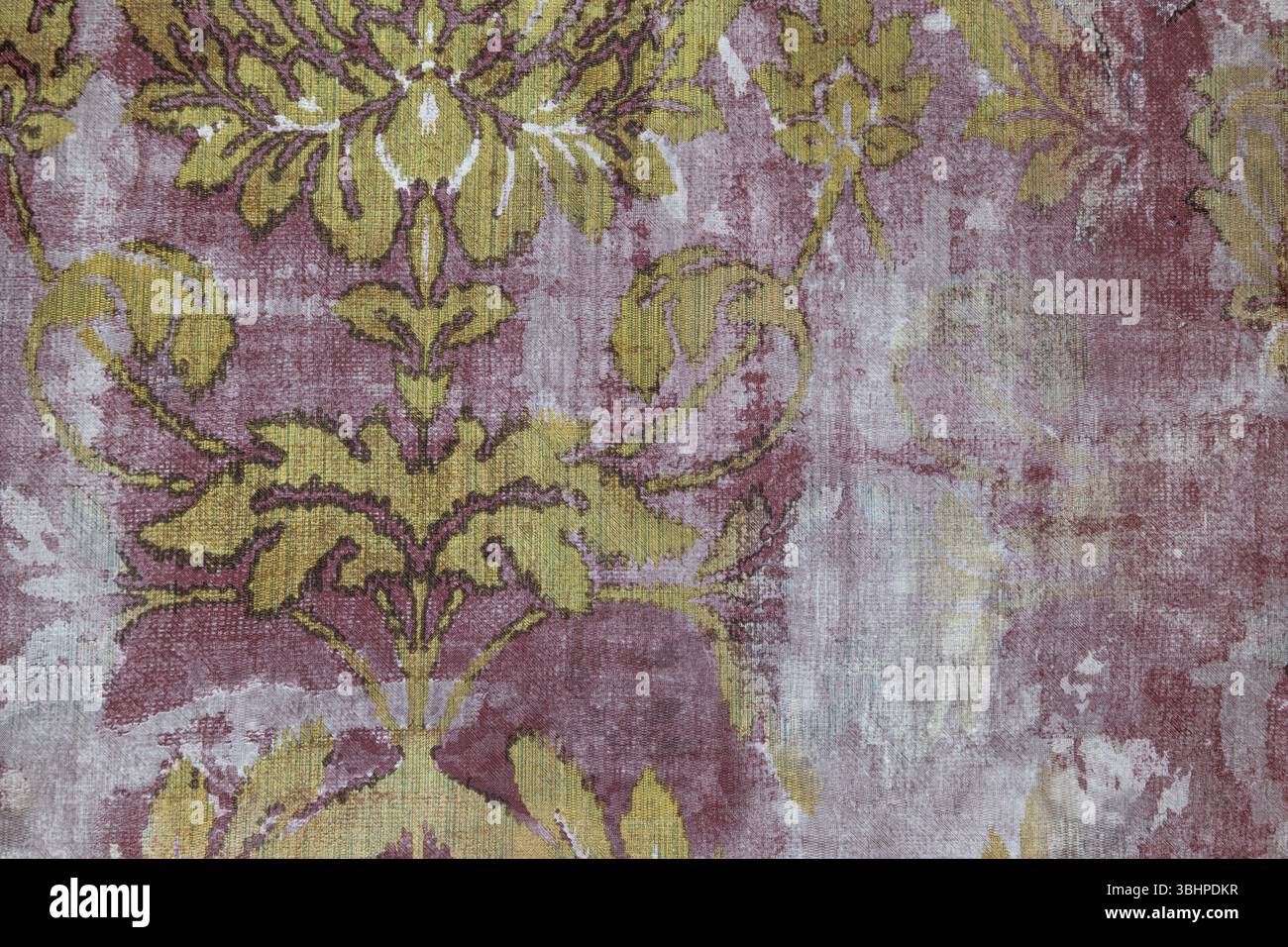 Vintage Floral Fabric Wallpaper with Gold and Purple Damask Pattern Texture Stock Photo