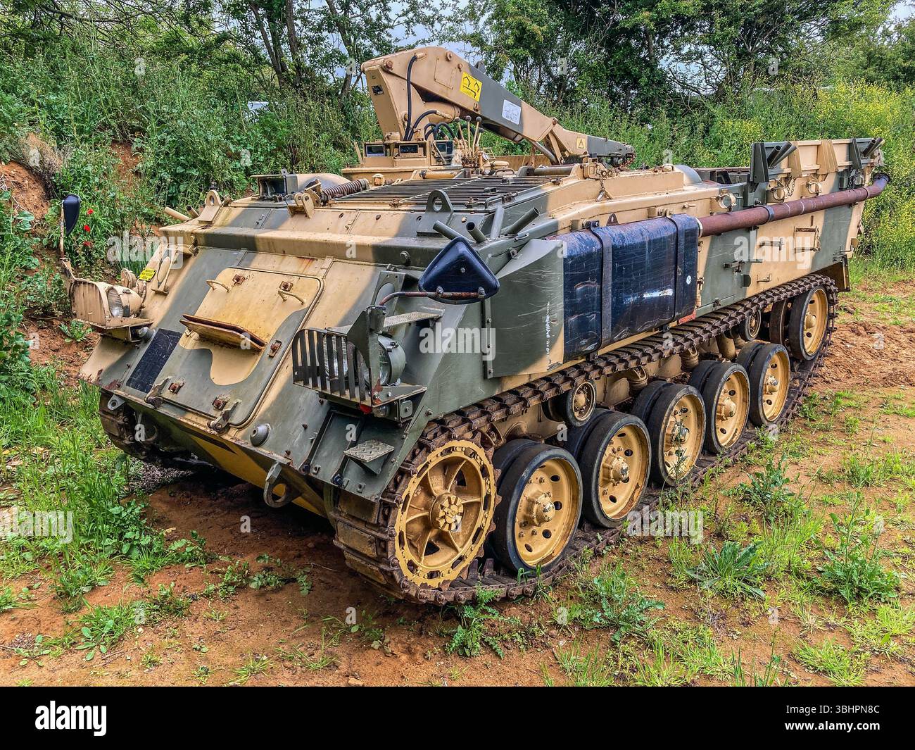 Three-quarters Front View of a Green, GKN FV432 Armoured Personnel Carrier fitted with a hydraulic crane, at the Capel Battery, - Smartphone Captured Stock Image