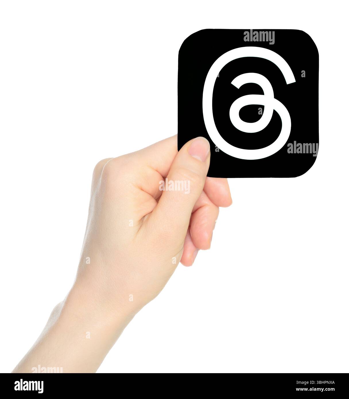 Hand holds paper Threads mobile app icon, on a transparent background ...