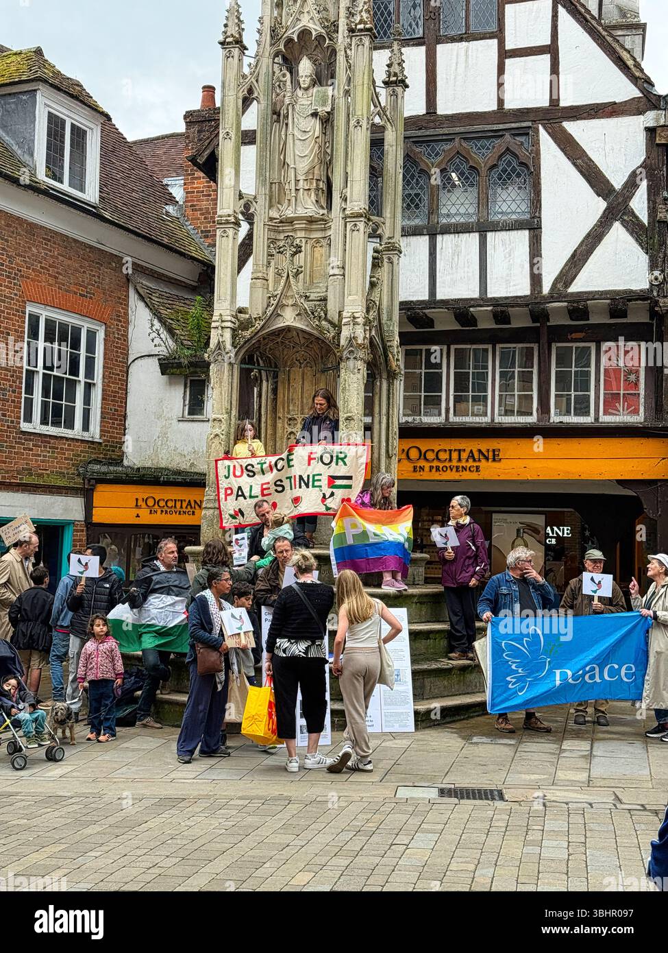 Save Palestine protest at the Buttercross Monument on Winchester High Street, Hampshire UK - Smartphone Captured Stock Image