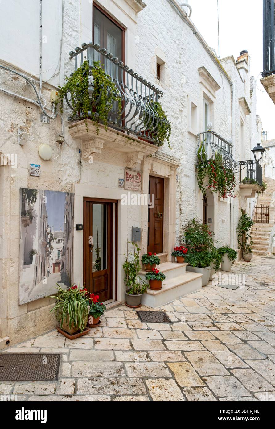 Narrow alley in Locorotondo, Apulia - Puglia, Italy Stock Photo