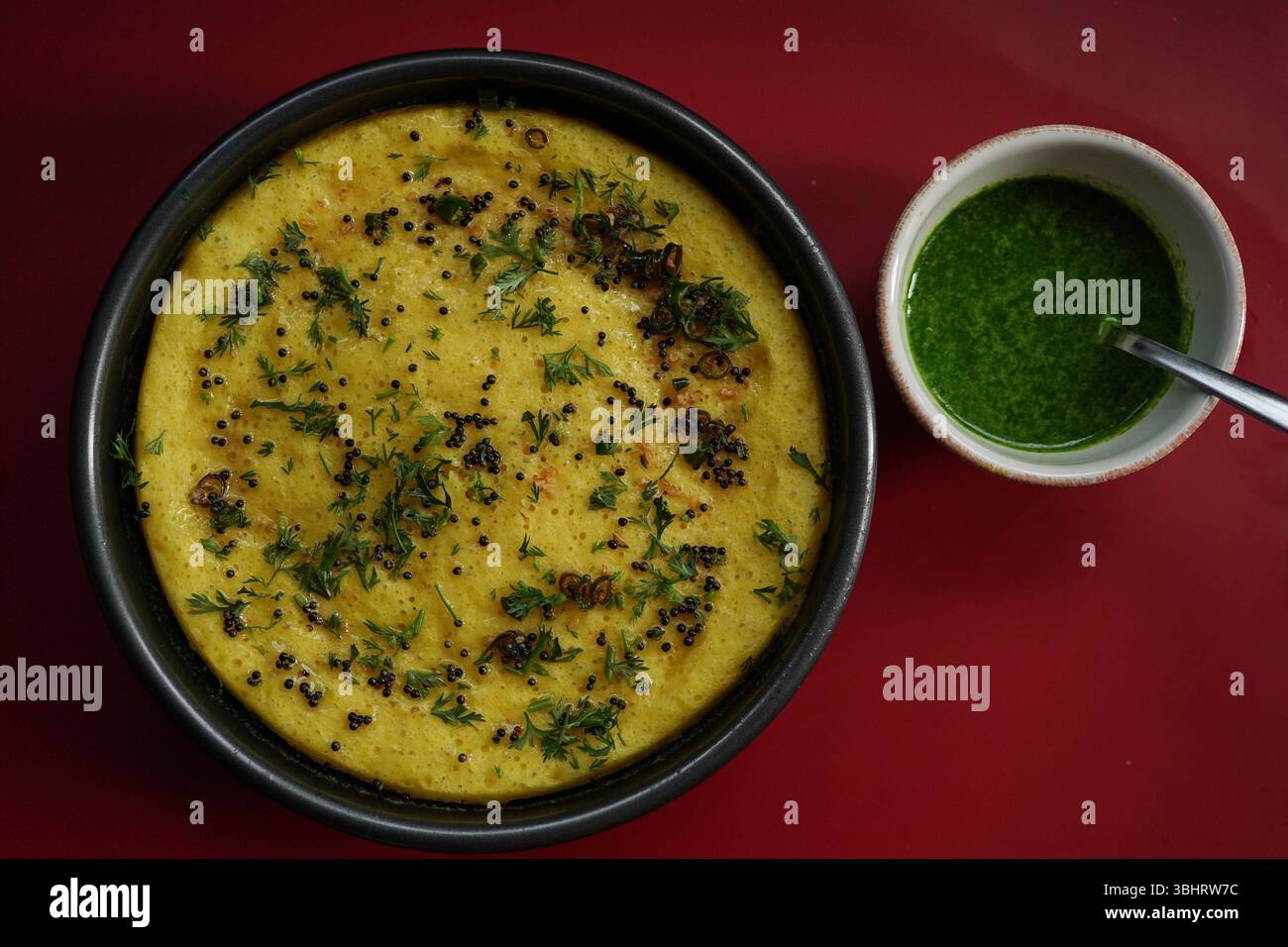 Dhokla - Popular Indian gujarati steamed breakfast dish with chickpea flour Stock Photo